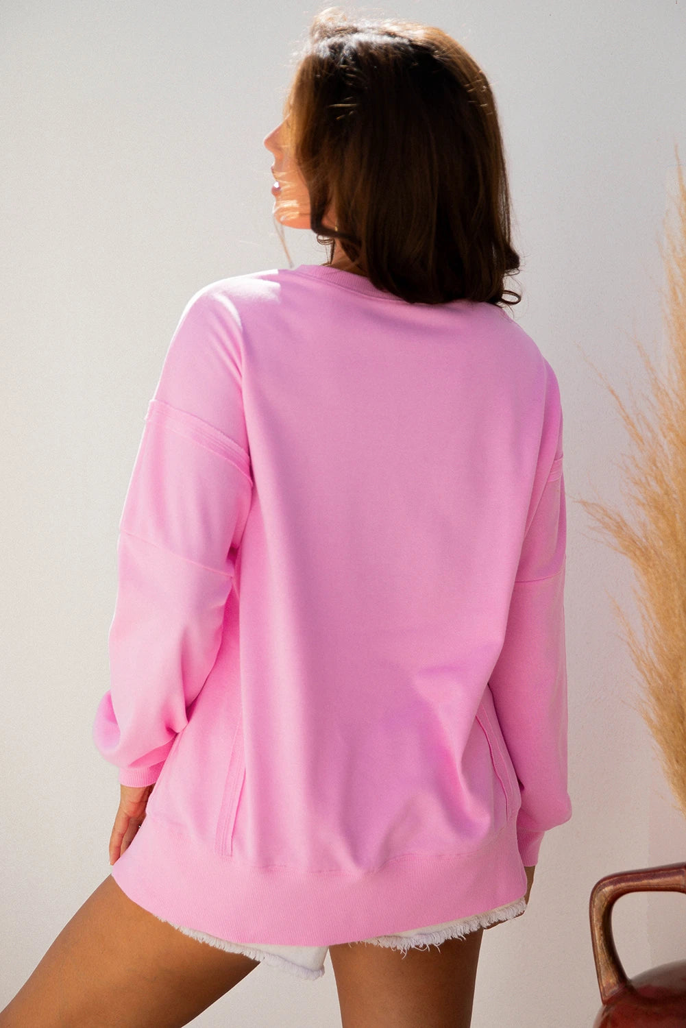 Pink Bow Sequin XOXO Letter Graphic Exposed Seam Baggy Sweatshirt